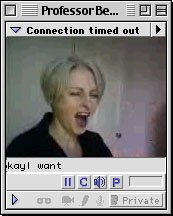 An old school GUI grey media player with a square screen of a woman with short white hair eyes closed and mouth wide open, as if she is screaming or singing at the top of her lungs.