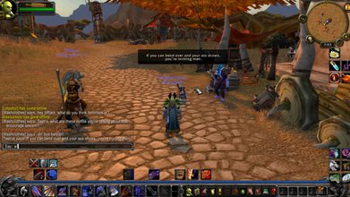 Still of World of Warcraft with two characters on an yellow pebbled street with black speech bubble