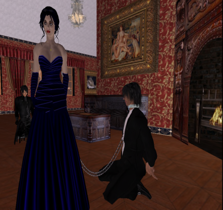 Two avatars in Second Life. A mistress wears a black ball gown, standing in a room with ornate, red wallpaper. Her submissive is kneeling beside her wearing a tuxedo.