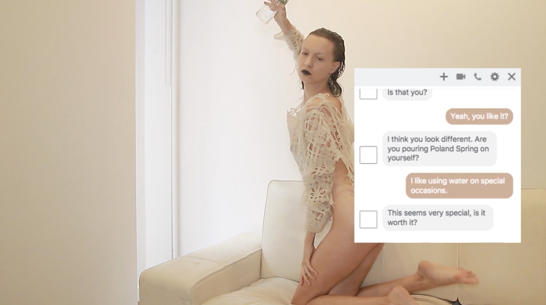 a cream colored room with soft light. A woman with wet hair pours water on herself on a couch in a seductive pose, overlaid with a text message thread