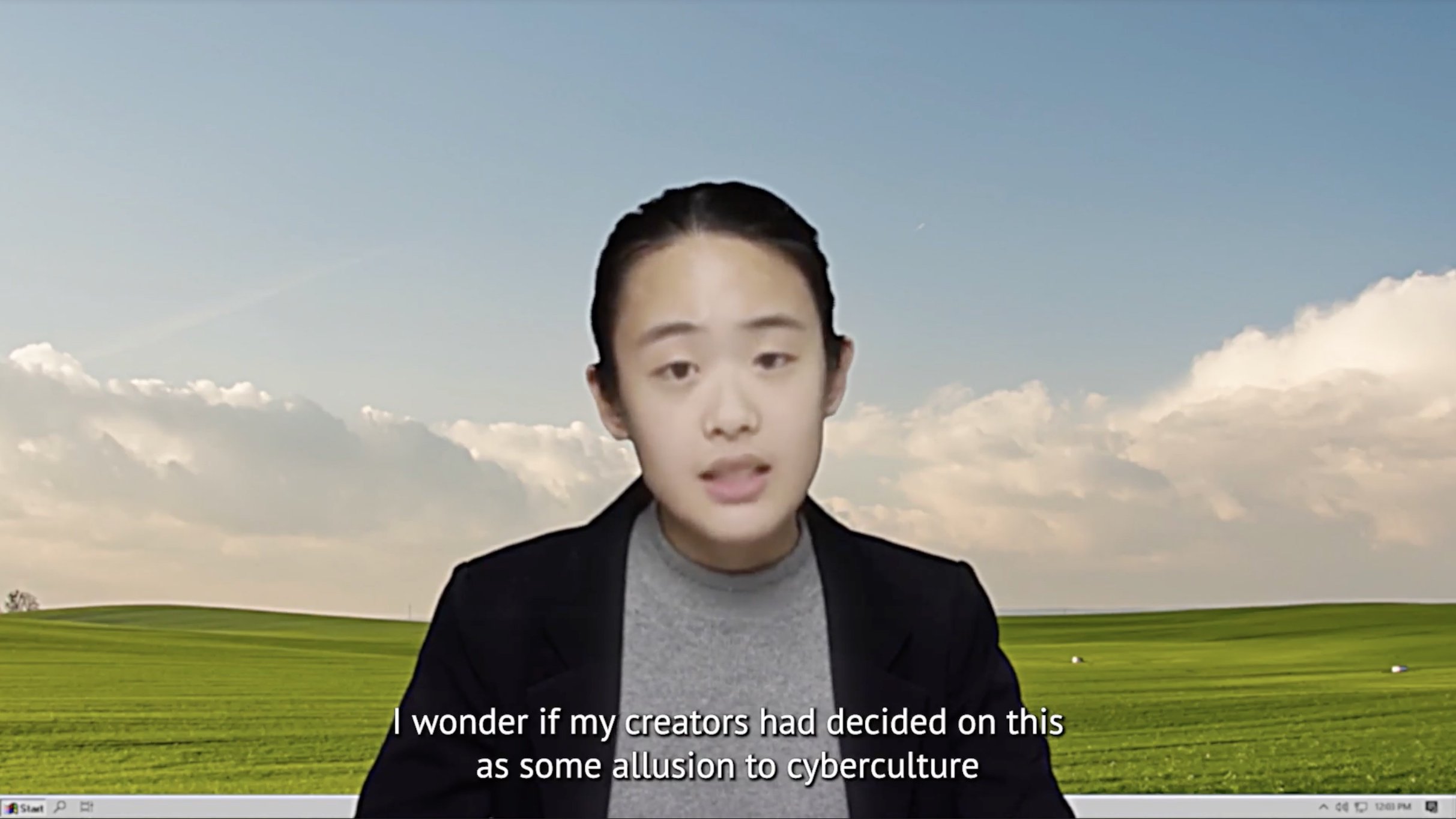 an asian woman wearing a black blazer and gray shirt sits on a retro browser background with green hills and clouds