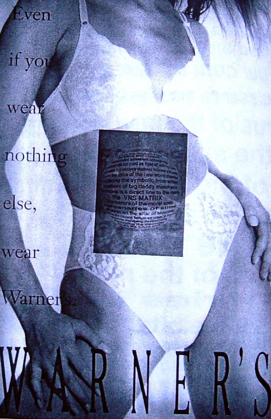Black and white poster of the spherical Cyberfeminist Manifesto wheat pasted onto a Warner advertisement, showing a women from the neck down posing while wearing white lace lingerie.