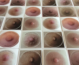 a grid of different color nipples