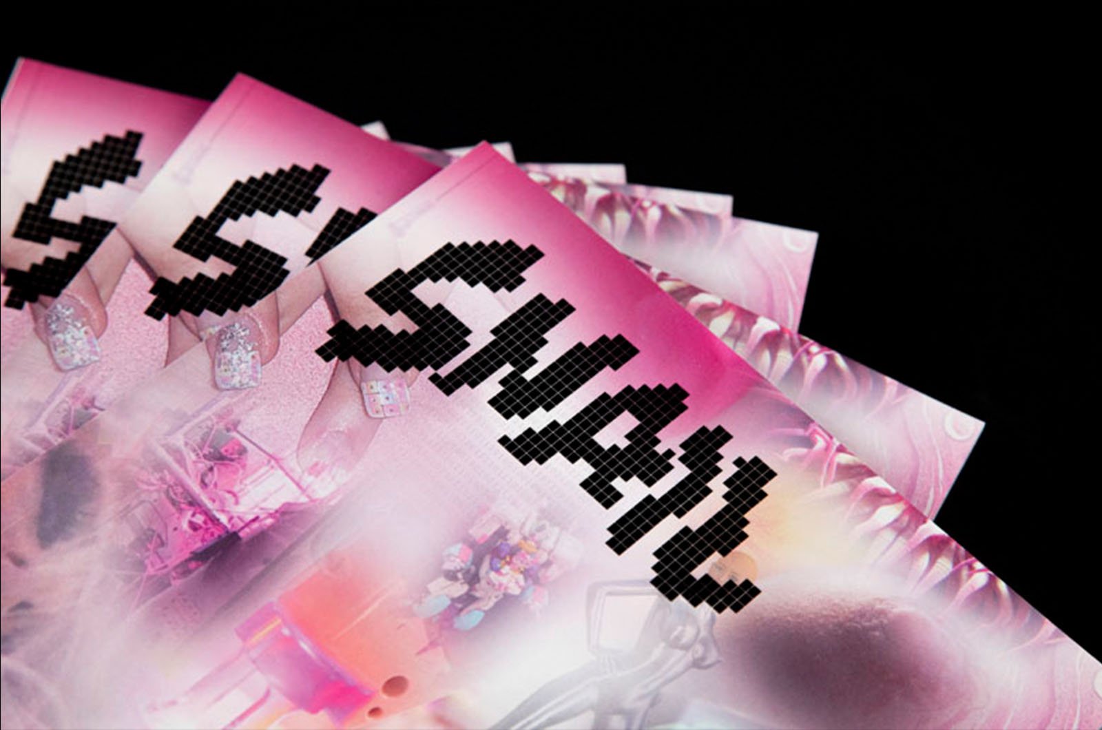 4 stacked covers of a pink magazine; the logo is Snail in a black pixelated font on top of an image with pink blurred images