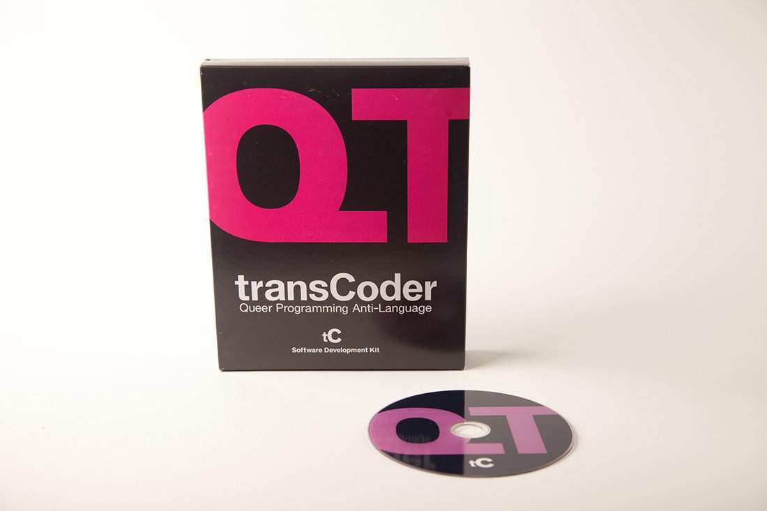 Black box with large pink type that reads QT with “transCoder” in white underneath. In front of the box sits a black CD-Rom with pink QT printed on top